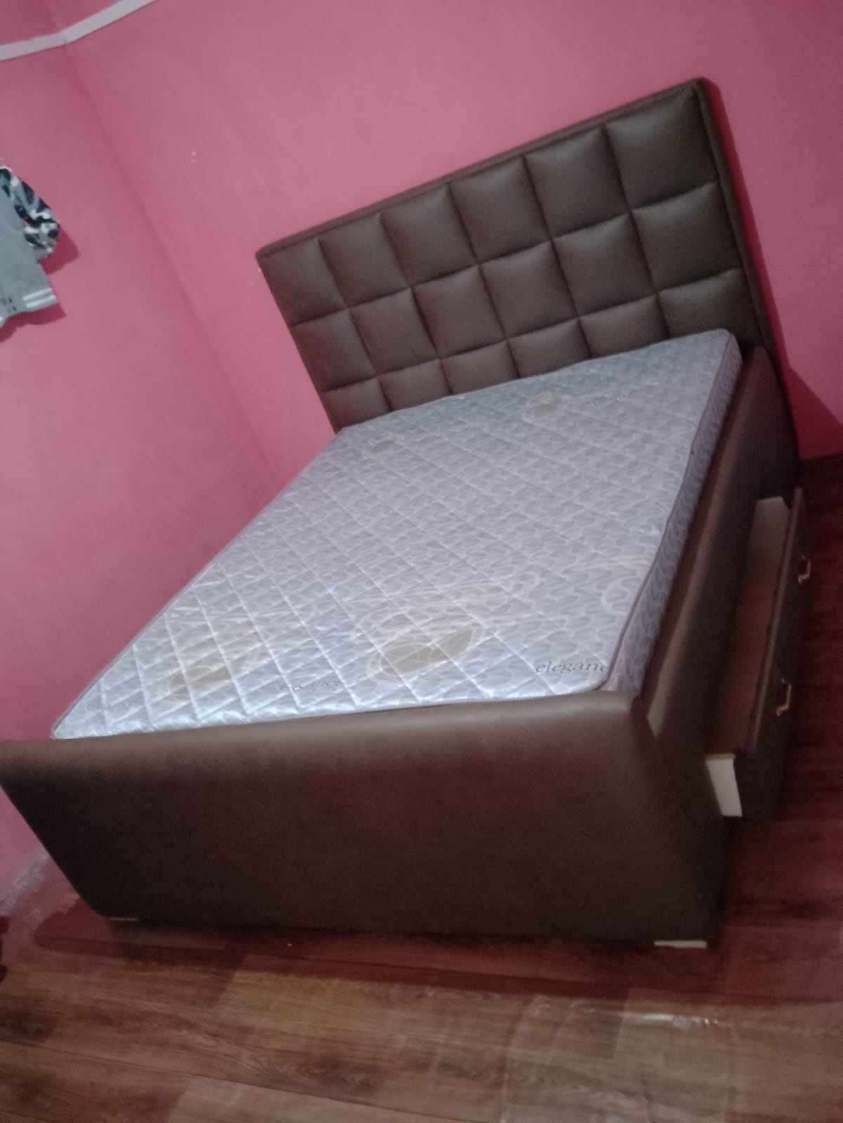 Tufted leather bed